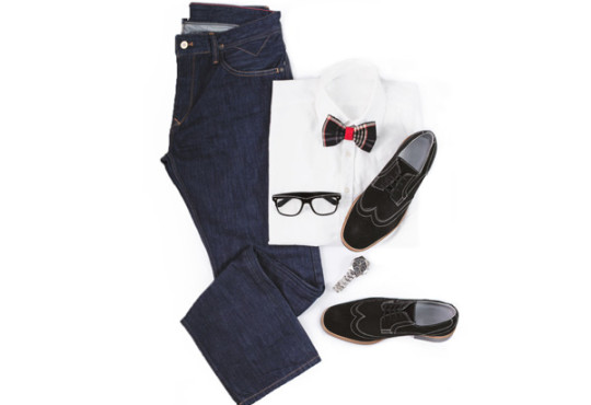 Blue jeans, white shirt, bow tie, black frame glasses, black dress shoes, and watch
