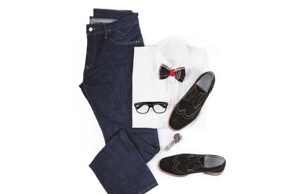 Blue jeans, white shirt, bow tie, black frame glasses, black dress shoes, and watch